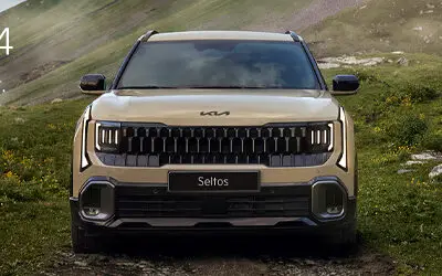 Neuer Kia Seltos 4x4 vor Bergkulisse